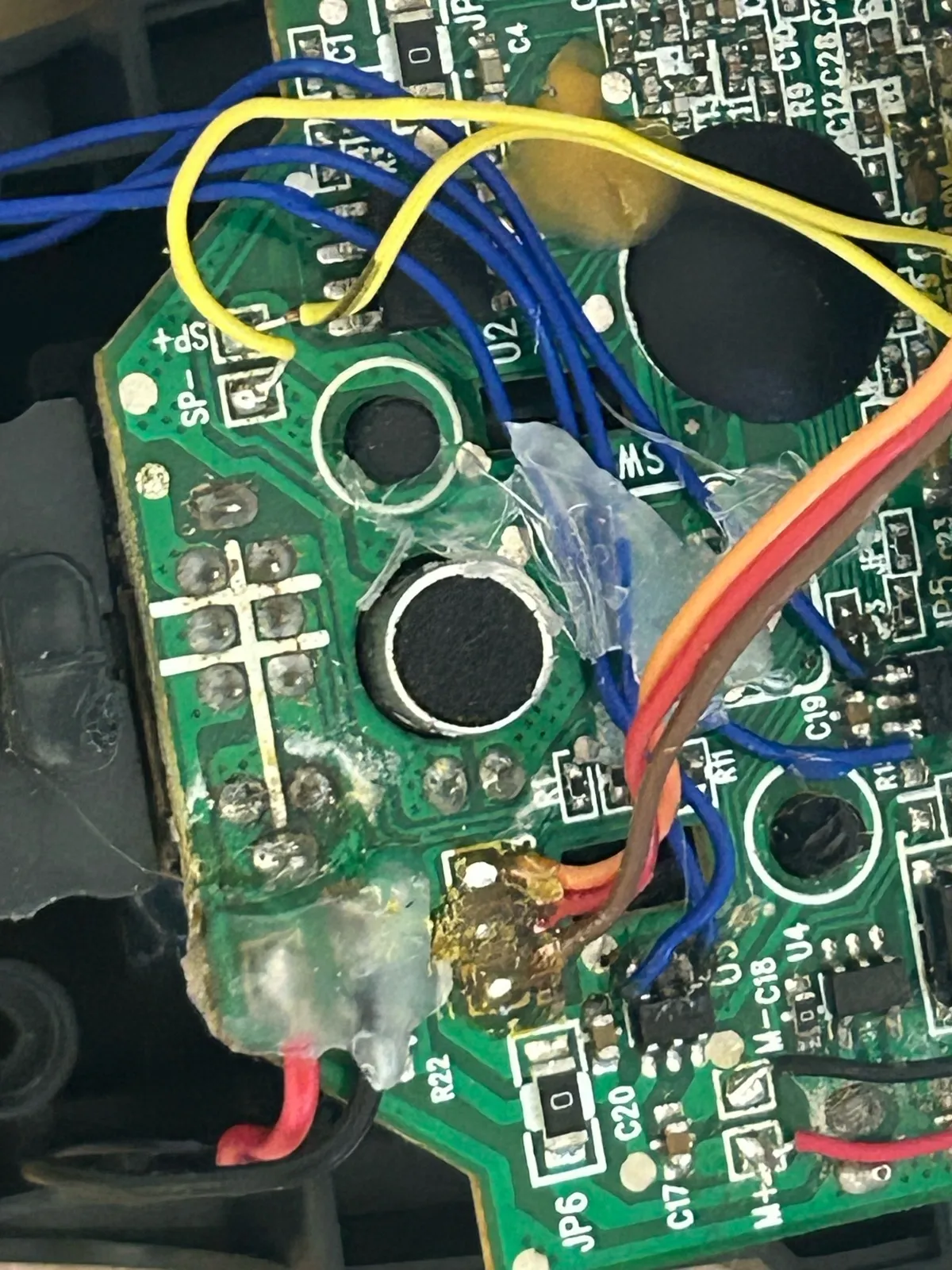 The power wire joint held in place with hot glue